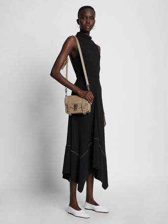 Image of model wearing PS1 Mini Crossbody Bag in LIGHT TAUPE