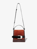 Front  image of Buckle Trapeze Bag in Grainy Calf and Suede in Russet with strap extended