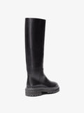 3/4 image of Lug Sole Tall Boots in Black