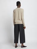 Back full length image of model wearing Eco Cashmere Sweater in OATMEAL