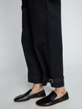 Detail image of model wearing Cotton Twill Tapered Pants in BLACK