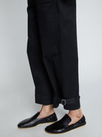 Detail image of model wearing Cotton Twill Tapered Pants in BLACK