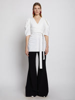 Front full length image of model wearing Linen Viscose Shirred Sleeve Top in OFF WHITE