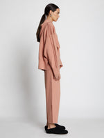 Side image of model wearing Cashmere Blend Sweatpants in rose/burgundy