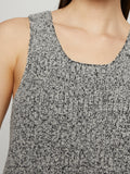 Detail image of model wearing Melange Boucle Knit Tank in black/white multi