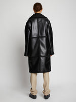 Back image of model wearing Faux Sherpa Coat in black