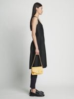 Image of model wearing Small Raffia PS Harris Bag in NATURAL