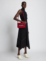 Image of model wearing PS11 Mini Classic Bag in BORDEAUX