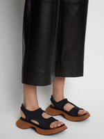 Image of model wearing Stretch Rec Sandals in black