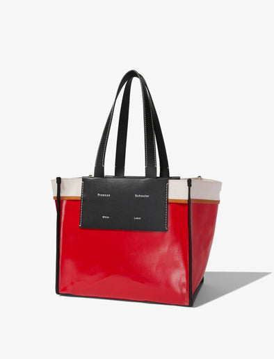 Side image of Large Morris Coated Canvas Tote in crimson