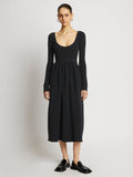 Front full length image of model wearing Rib Knit Long Sleeve Dress in BLACK