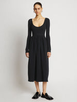 Front full length image of model wearing Rib Knit Long Sleeve Dress in BLACK