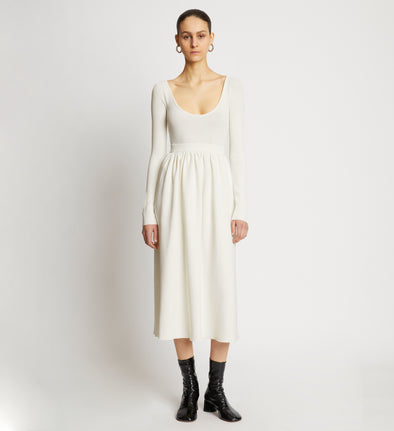 Front full length image of model wearing Rib Knit Long Sleeve Dress in OFF WHITE