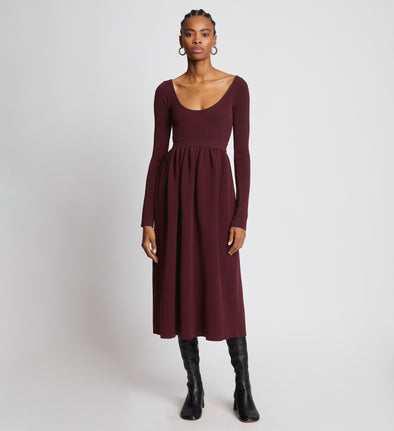 Front full length image of model wearing Rib Knit Long Sleeve Dress in PLUM