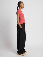 Side full length image of model wearing Rib Knit Polo Top in ROSE