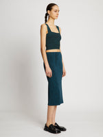 Side full length image of model wearing Knit Bustier Top in BLACK/DUSTY BLUE