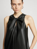 Detail image of model wearing Faux Leather Sleeveless Dress in BLACK