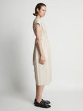 Side full length image of model wearing Leather Pintuck Dress in BLUSH