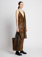 Image of model carrying Leopard Printed Haircalf North South Tote in LEOPARD