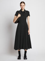 Front full length image of model wearing Lightweight Crepe Buttoned Dress in BLACK