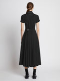 Back full length image of model wearing Lightweight Crepe Buttoned Dress in BLACK