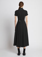 Back full length image of model wearing Lightweight Crepe Buttoned Dress in BLACK