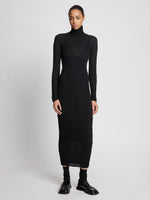 Front full length image of model wearing Shibori Turtleneck Dress in BLACK