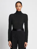 Front cropped image of model wearing Shibori Turtleneck Top in BLACK