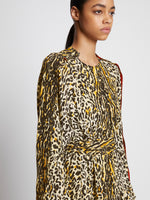 Detail image of model wearing Printed Leopard Crepe Belted Dress in BUTTER MULTI