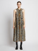 Front full length image of model wearing Printed Leopard Sleeveless Dress in BUTTER MULTI