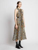 Side full length image of model wearing Printed Leopard Sleeveless Dress in BUTTER MULTI