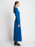 Side full length image of model wearing Pleated Matte Jersey Halter Dress in BLUE