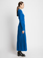 Side full length image of model wearing Pleated Matte Jersey Halter Dress in BLUE