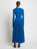 Back full length image of model wearing Pleated Matte Jersey Halter Dress in BLUE