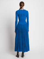 Back full length image of model wearing Pleated Matte Jersey Halter Dress in BLUE