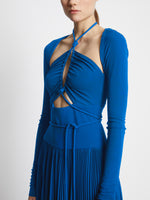 Detail image of model wearing Pleated Matte Jersey Halter Dress in BLUE