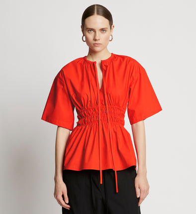 Front cropped image of model wearing Poplin Drawstring Blouse in BRIGHT ORANGE