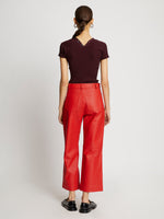 Back full length image of model wearing Leather Culottes in RED