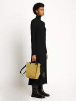 Image of model wearing Large Mercer Suede Tote in FATIGUE