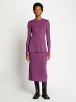 Front full length image of model wearing Lurex Crewneck Sweater in MAGENTA/SILVER