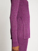 Detail image of model wearing Lurex Crewneck Sweater in MAGENTA/SILVER