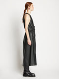 Side full length image of model wearing Faux Leather Drawstring Sleeveless Dress in BLACK