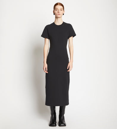 Front full length image of model wearing Short Sleeve Sweatshirt Dress in BLACK