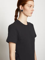 Detail image of model wearing Short Sleeve Sweatshirt Dress in BLACK