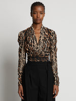 Front cropped image of model wearing Leopard Crepe De Chine V-Neck Top in BROWN MULTI