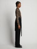 Side full length image of model wearing Leopard Crepe De Chine V-Neck Top in BROWN MULTI