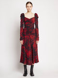 Front full length image of model wearing Painted Spiral Crepe De Chine Cinched Dress in RED MULTI