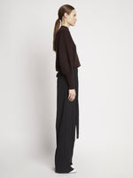 Side full length image of model wearing Eco Cashmere Balloon Sleeve Sweater in BROWN