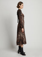 Side full length image of model wearing Leopard Crepe De Chine Cinched Dress in BROWN MULTI