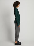 Side full length image of model wearing Flannel Tapered Pants in GREY MELANGE